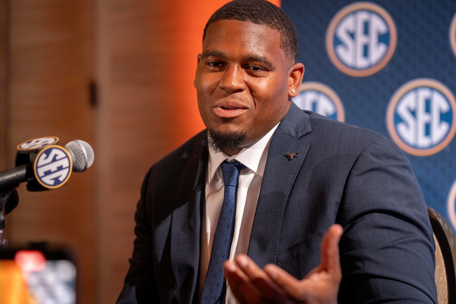 Texas offensive lineman Kelvin Banks Jr. speaks during the Southeastern Conference NCAA college football media days Wednesday, July 17, 2024, in Dallas. (AP Photo/Jeffrey McWhorter)