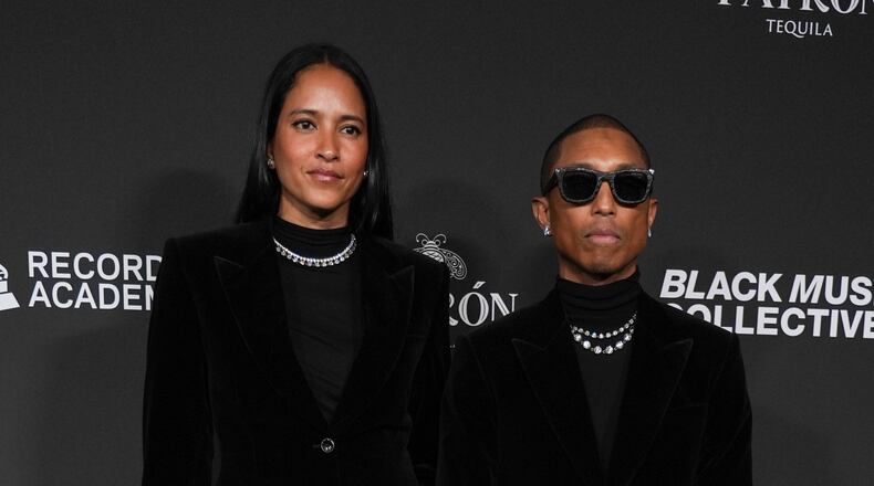 Helen Lasichanh, left, and Pharrell Williams attend the Recording Academy Honors presented by the Black Music Collective on Thursday, Jan. 29, 2026, in Los Angeles. (Photo by Richard Shotwell/Invision/AP)