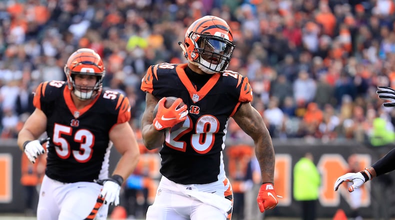 CINCINNATI, OH - DECEMBER 16: Joe Mixon #28 of the Cincinnati Bengals runs for a touchdown against the Oakland Raiders at Paul Brown Stadium on December 16, 2018 in Cincinnati, Ohio. (Photo by Andy Lyons/Getty Images)