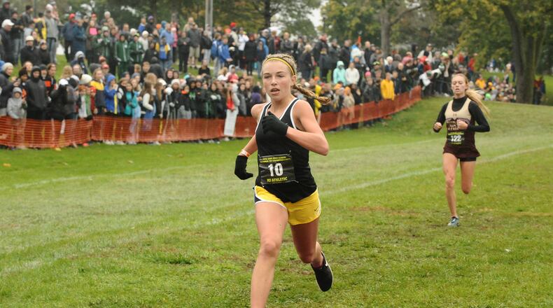 The Centerville Elks, including sophomore Emma Bucher (No. 10), attempt to win a fifth straight state championship at the Division I cross country meet Saturday. Contributed / Greg Billing