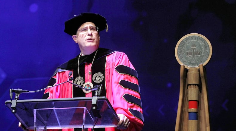 The installation of Eric F. Spina, as the 19th president of the University of Dayton, was held at UD Arena Tuesday. Spina, who became UD’s president July 1, 2016, succeeds Daniel J. Curran. LISA POWELL / STAFF