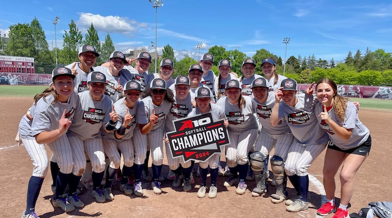 The Dayton softball team poses for a photo after winning the Atlantic 10 Conference tournament on Saturday, May 11, 2024, in Bronx, N.Y. Photo courtesy of UD