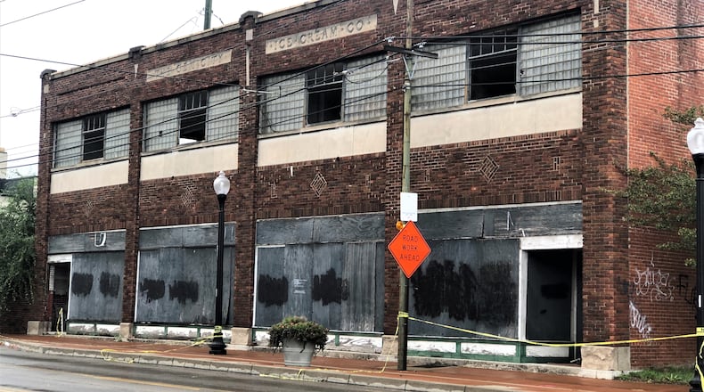 The Gem City Ice Cream Co. building, briefly the site of the Wright brothers' first bike shop, sits at 1005 W. Third St. The city of Dayton wants to demolish the property, which officials say is a nuisance. CORNELIUS FROLIK / STAFF
