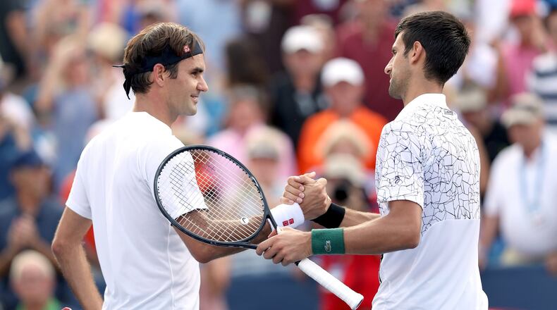 MASON, OH - AUGUST 19: Roger Federer of Switzerland congratulates Novak Djokovic of Serbia after their match during the men’s final of the Western & Southern Open at Lindner Family Tennis Center on August 19, 2018 in Mason, Ohio. (Photo by Matthew Stockman/Getty Images)