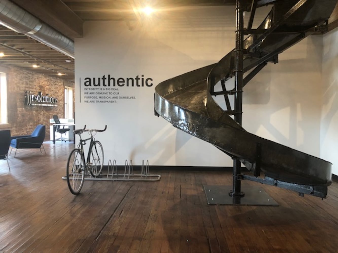 PHOTOS: Inside the new downtown Dayton office that has an industrial slide