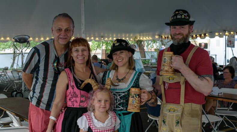 Prost! The 37th Annual Germanfest Picnic Lite was held at the Dayton Liederkranz-Turner German Club in Dayton's St. Anne's Hill Historic District from Friday, August 14th through Sunday, August 16, 2020. Even though the full festival couldn't be held at RiverScape MetroPark due to the COVID-19 pandemic, German food and beer were enjoyed by guests in two tents with socially distanced tables. The festival's signature food, beer and merchandise were available via a new online ordering option with the choice of carryout or curbside pickup which received an overwhelming response from the community. Did we spot you at the Kranz? TOM GILLIAM/CONTRIBUTING PHOTOGRAPHER