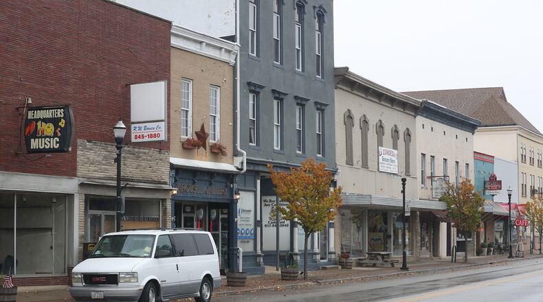 Downtown New Carlisle has several small businesses. BILL LACKEY/STAFF