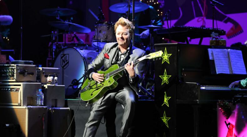 The Brian Setzer Orchestra performed Saturday, Dec. 5, 2015 at a sold-out Cobb Energy Centre in Atlanta as part of its annual Christmas Rocks concert. Fans were treated to a rousing night of Stray Cats and holiday standards with the 3-time Grammy winner's swing and rockabilly interpretations. Robb D. Cohen/ RobbsPhotos.com