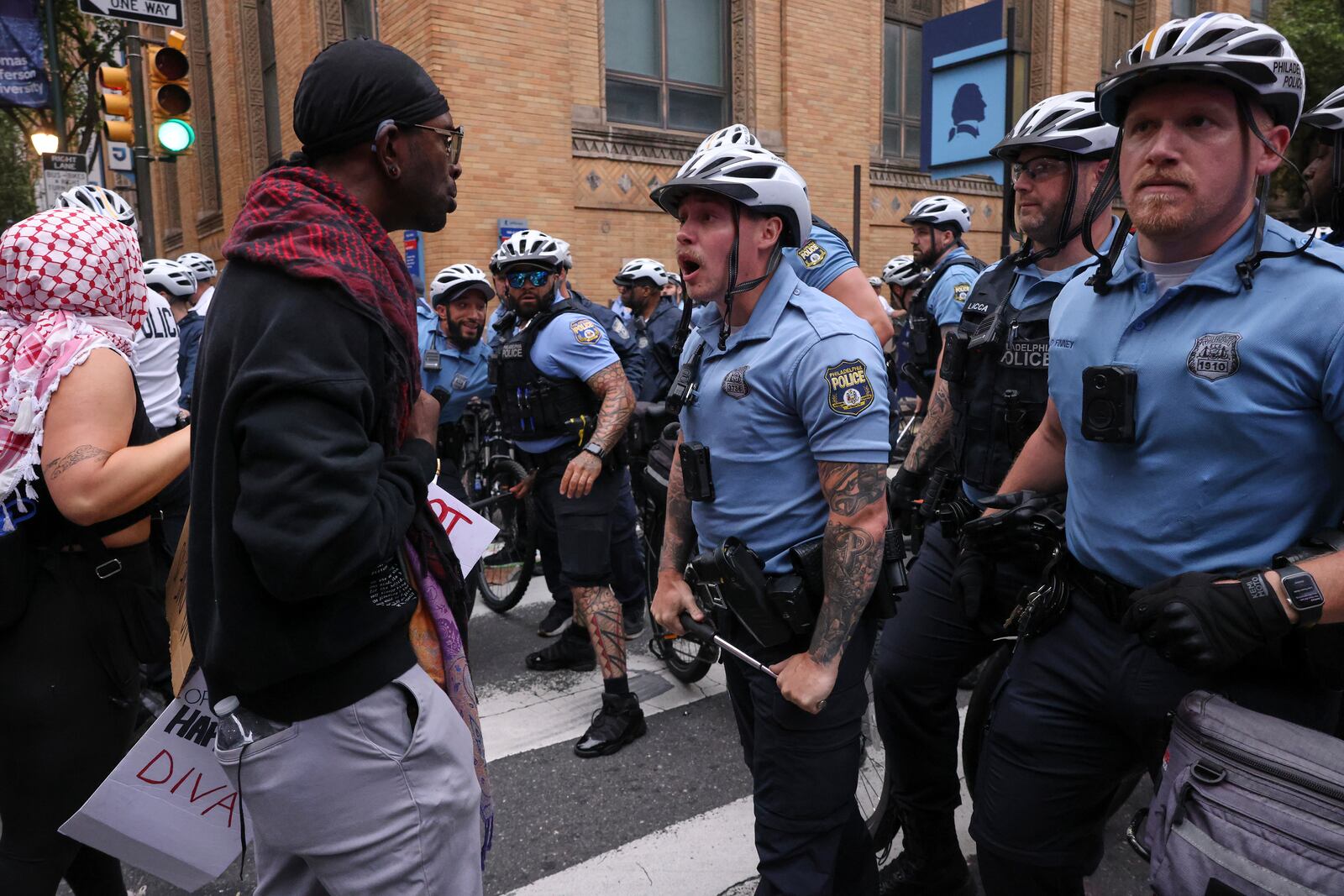 Protestors confront police officers during a protest, Saturday, June 14, 2025, in Philadelphia. (AP Photo/Yuki Iwamura)
