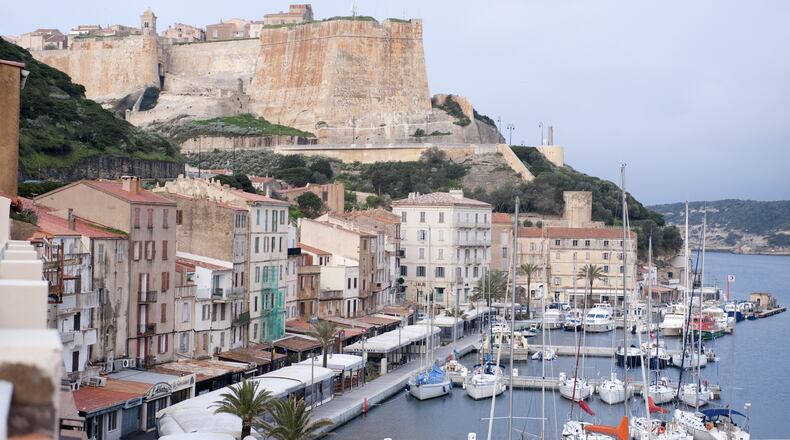 The cliff-top citadel and harbor of Bonifacio, a medieval town on the southern tip of the French island of Corsica, in March, 2016. Corsica is a resilient and dramatically beautiful island that holds itself apart from mainland France. (Susan Wright/The New York Times)