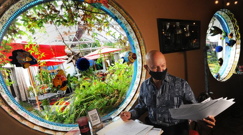 Bill Castro, owner of El Meson, has been inundated with unemployment claims being filed fraudulently in his restaurant's name. MARSHALL GORBY\STAFF