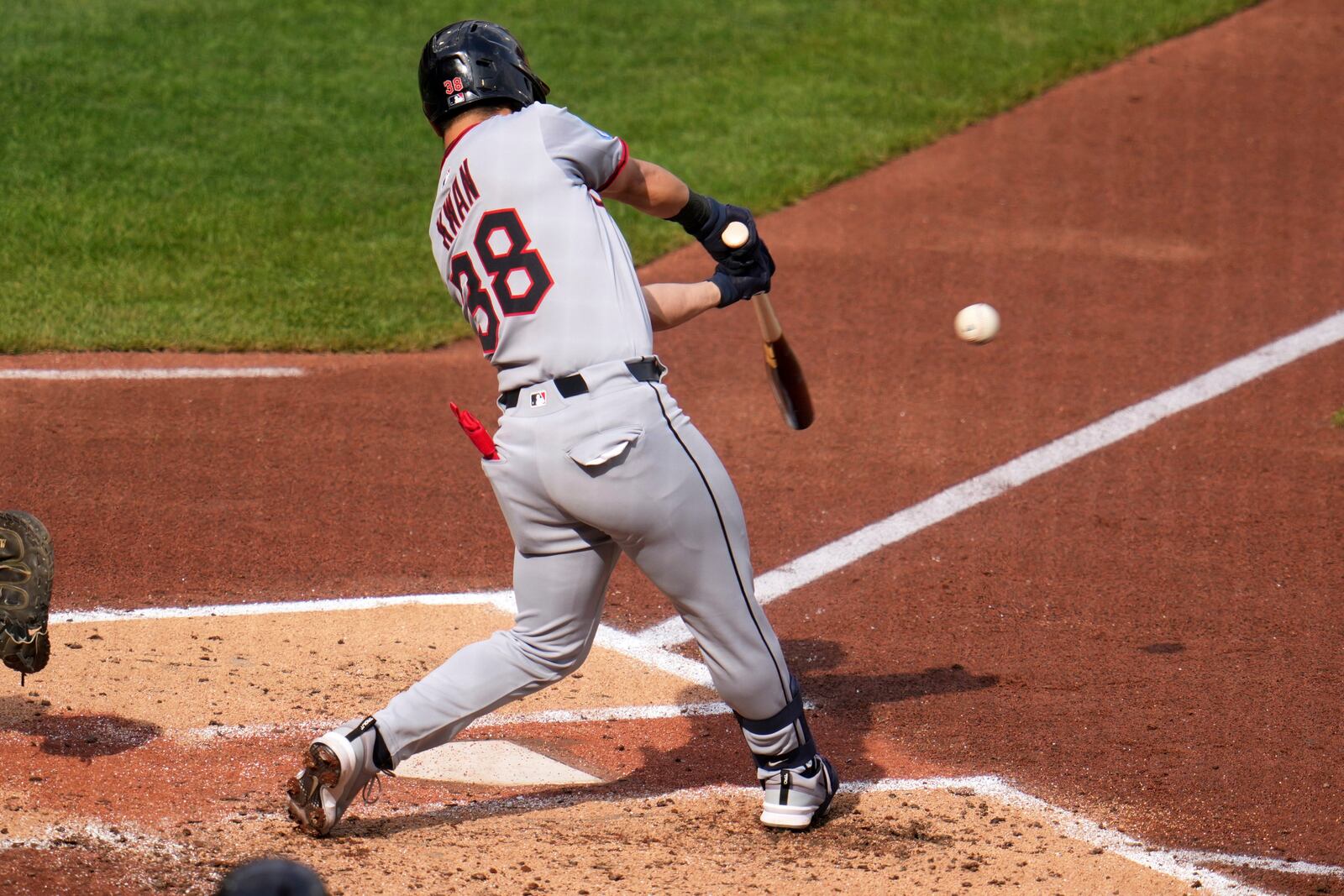 Cleveland Guardians' Steven Kwan singles off Pittsburgh Pirates pitcher Paul Skenes, driving in a run, during the third inning of a baseball game in Pittsburgh, Saturday, April 19, 2025. (AP Photo/Gene J. Puskar)