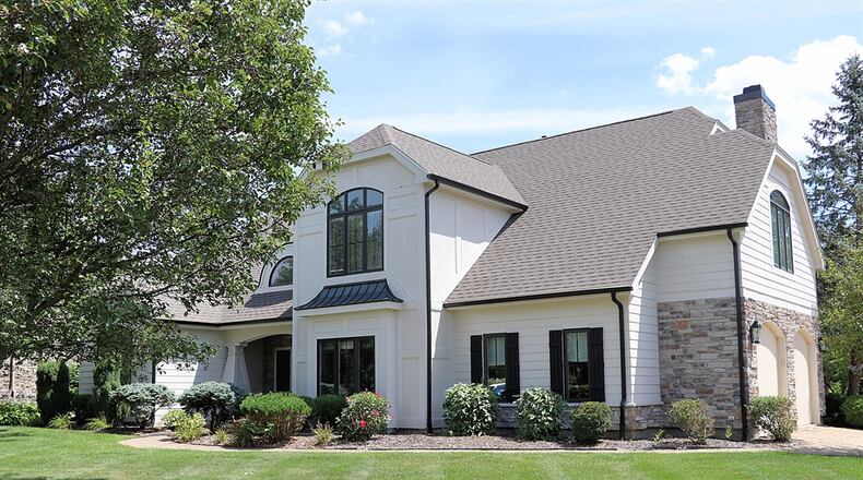 Volume ceilings, spacious social areas and a first-floor primary bedroom wing are just a few highlights to this updated two-story home in Beavercreek Twp. Contributed by Kathy Tyler