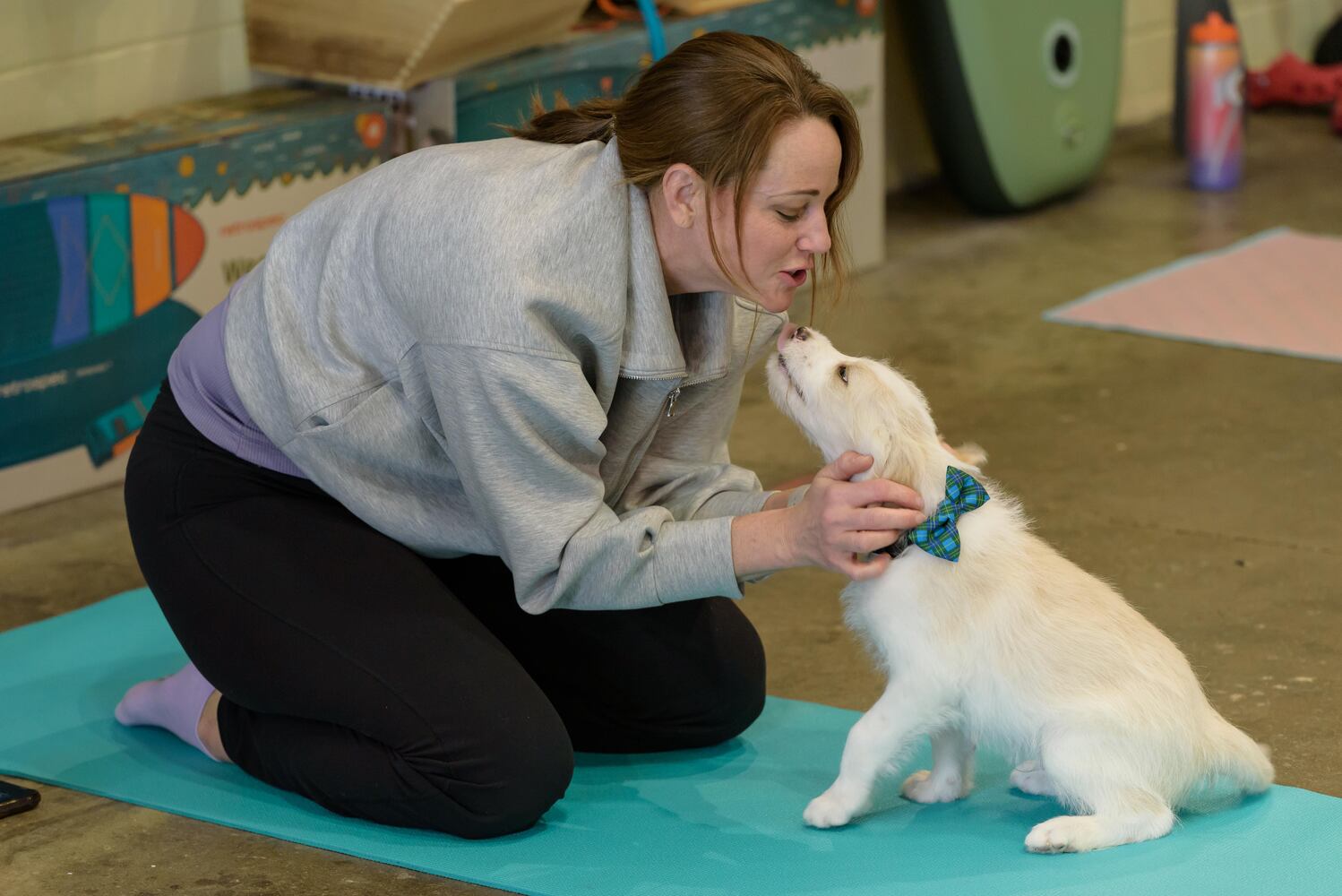 PHOTOS: Puppy Yoga with Adopt a Pit at Base Camp Outdoors Co. in downtown Dayton