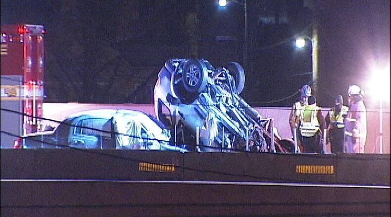 The scene of a deadly wrong-way crash on I-75 in downtown Dayton Feb. 13, 2016 that killed five people. DEANGELO BYRD/STAFF