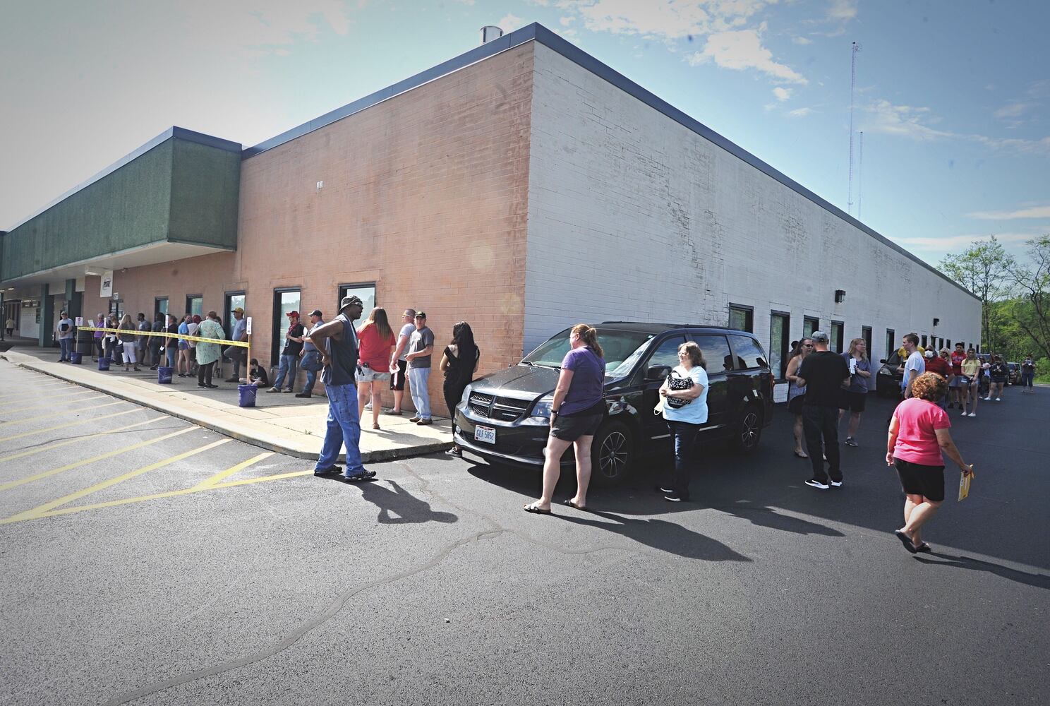 PHOTOS: Long lines as state BMV offices reopen after coronavirus shutdowns