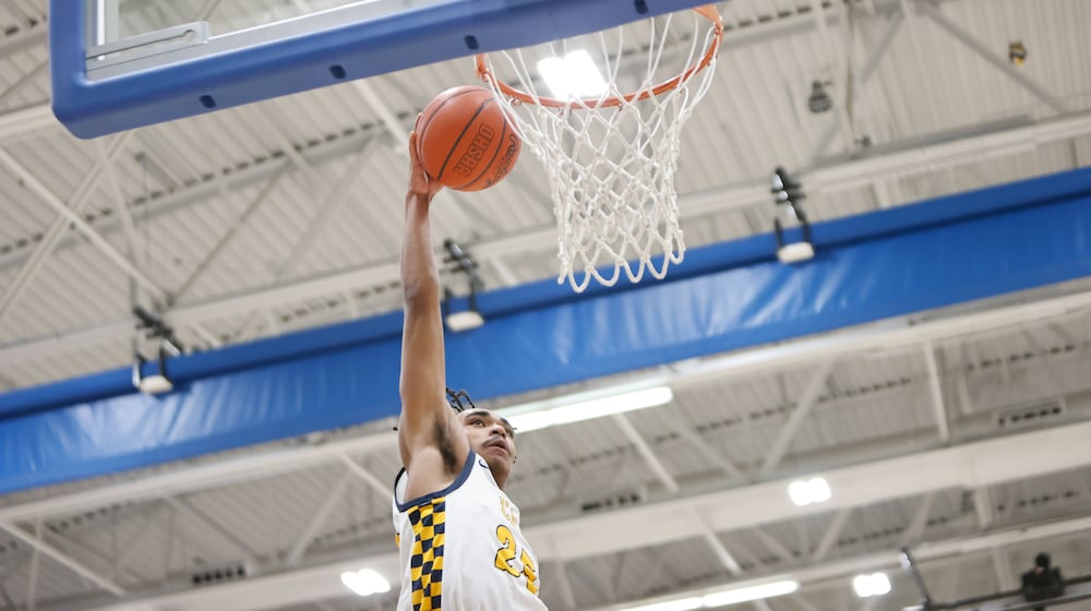 Springfield High School senior EJ Rice leaps for a dunk during their game against Fairmont on Tuesday, Jan. 6, 2026 at Springfield High School. The Firebirds won 54-46. MICHAEL COOPER / STAFF PHOTO