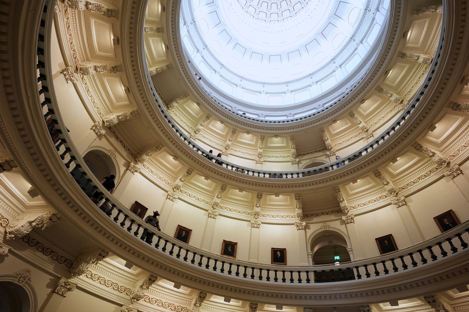 A state trooper keeps watch over the Rotunda at the Texas Capitol as the House calls a Special Session, Monday, July 21, 2025, in Austin. (AP Photo/Eric Gay)