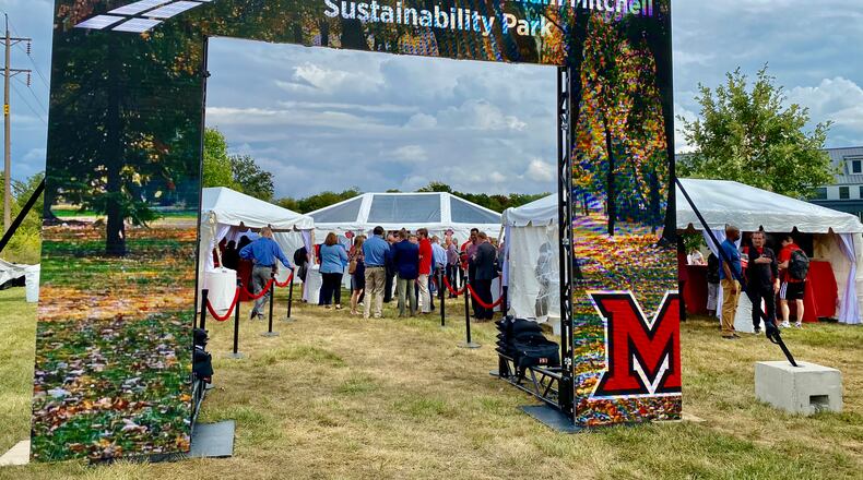 Miami University officials unveiled this week the school’s latest step toward switching its main campus to more sustainable energy with an announcement of a $5 million combined solar energy field and park.
Thanks to the two Miami graduate donors - Sharon and Graham Mitchell – and their $5 million gift toward the project, the school’s Western Campus will sport its first mixed use solar energy park by summer 2025. (Photo by Michael D. Clark/Journal-News)