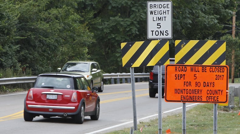 Work on a bridge over Holes Creek in Washington Twp. is prompting detours on Alex-Bell Road through the end of November. CHRIS STEWART / STAFF
