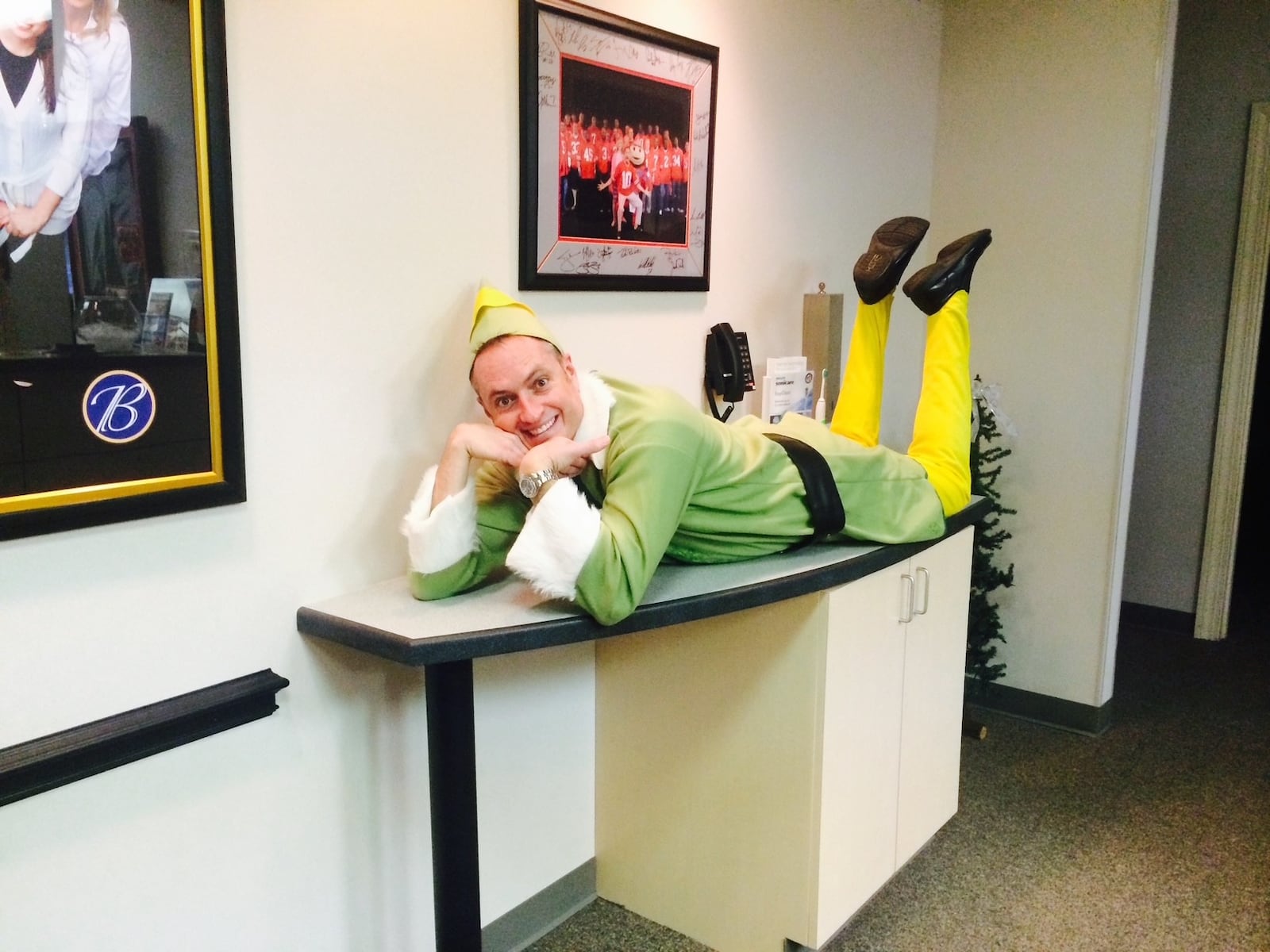 Dr. Steve Burke, who recently retired from Burke Orthodontics after 30 years as an orthodontist, does his impression of elf on a shelf. The practice has locations in Centerville and Huber Heights. CONTRIBUTED