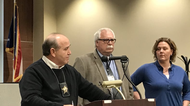 Greene County Sheriff Gene Fischer gives details Wednesday into the homicide investigation that left two people dead and no suspects so far in Miami Twp. TREMAYNE HOGUE / STAFF