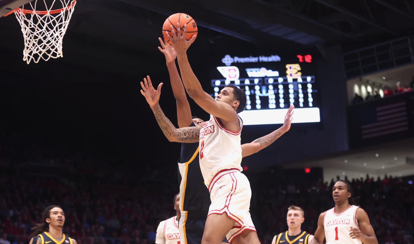 Dayton's De'Shayne Montgomery scores against East Tennessee State on Tuesday, Dec. 2, 2025, at UD Arena. David Jablonski/Staff