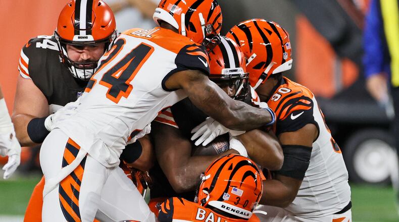 Cleveland Browns running back Nick Chubb, center, rushes for an 11-yard touchdown during the first half of an NFL football game against the Cincinnati Bengals, Thursday, Sept. 17, 2020, in Cleveland. (AP Photo/Ron Schwane)