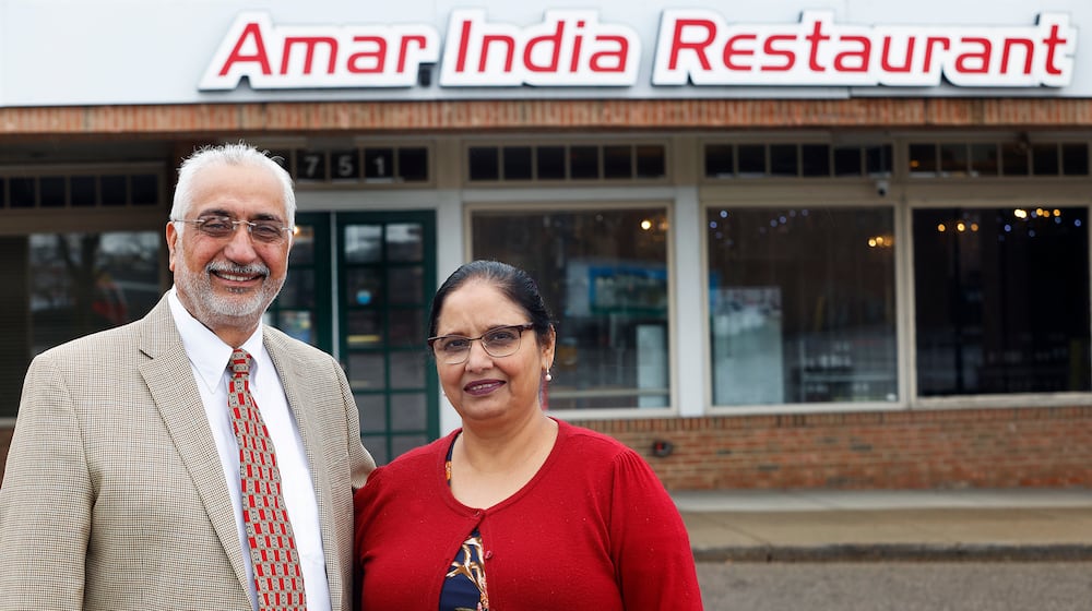 The owner of Amar India Restaurant, Surjit Singh Mattu with his wife, Jatinder K. Mattu. There are three of the restaurants in the Dayton area. MARSHALL GORBY\STAFF