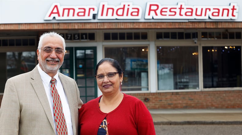 The owner of Amar India Restaurant, Surjit Singh Mattu with his wife, Jatinder K. Mattu. There are three of the restaurants in the Dayton area. MARSHALL GORBY\STAFF
