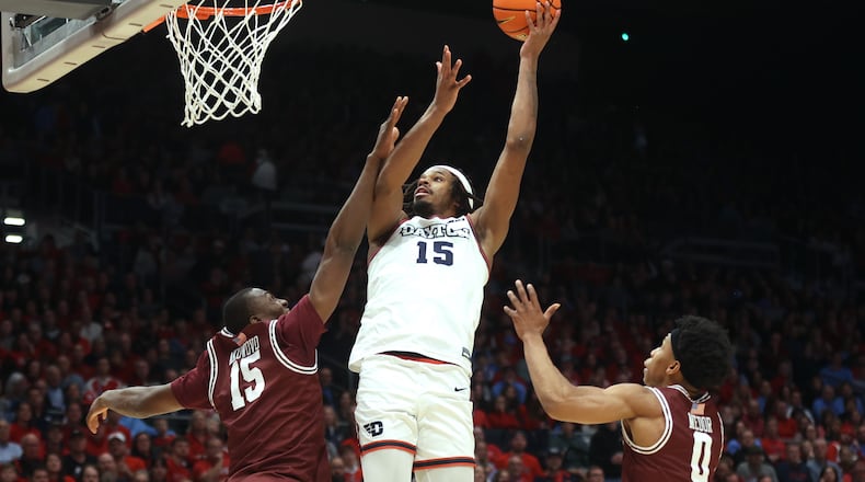 Dayton's DaRon Holmes II scores against Fordham on Saturday, Feb. 17, 2024, at UD Arena. David Jablonski/Staff