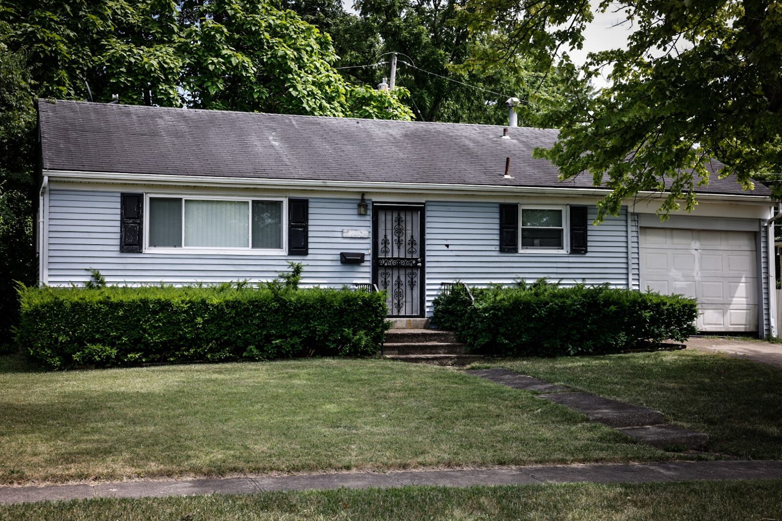 This house on Hackett Drive is at the center of a quitclaim deed fraud case in Montgomery County. JIM NOELKER/STAFF