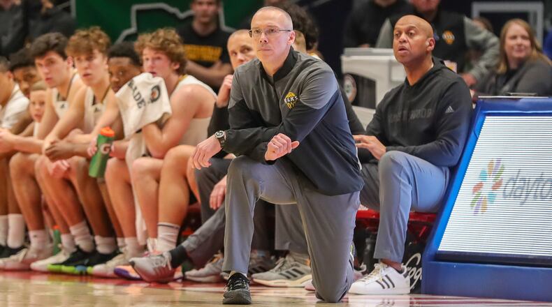 Centerville High School coach Brook Cupps talked after Saturday's loss in the state semifinal at UD Arena about important his son's leadership was to the success of the Elks the past three years. CONTRIBUTED PHOTO BY MICHAEL COOPER