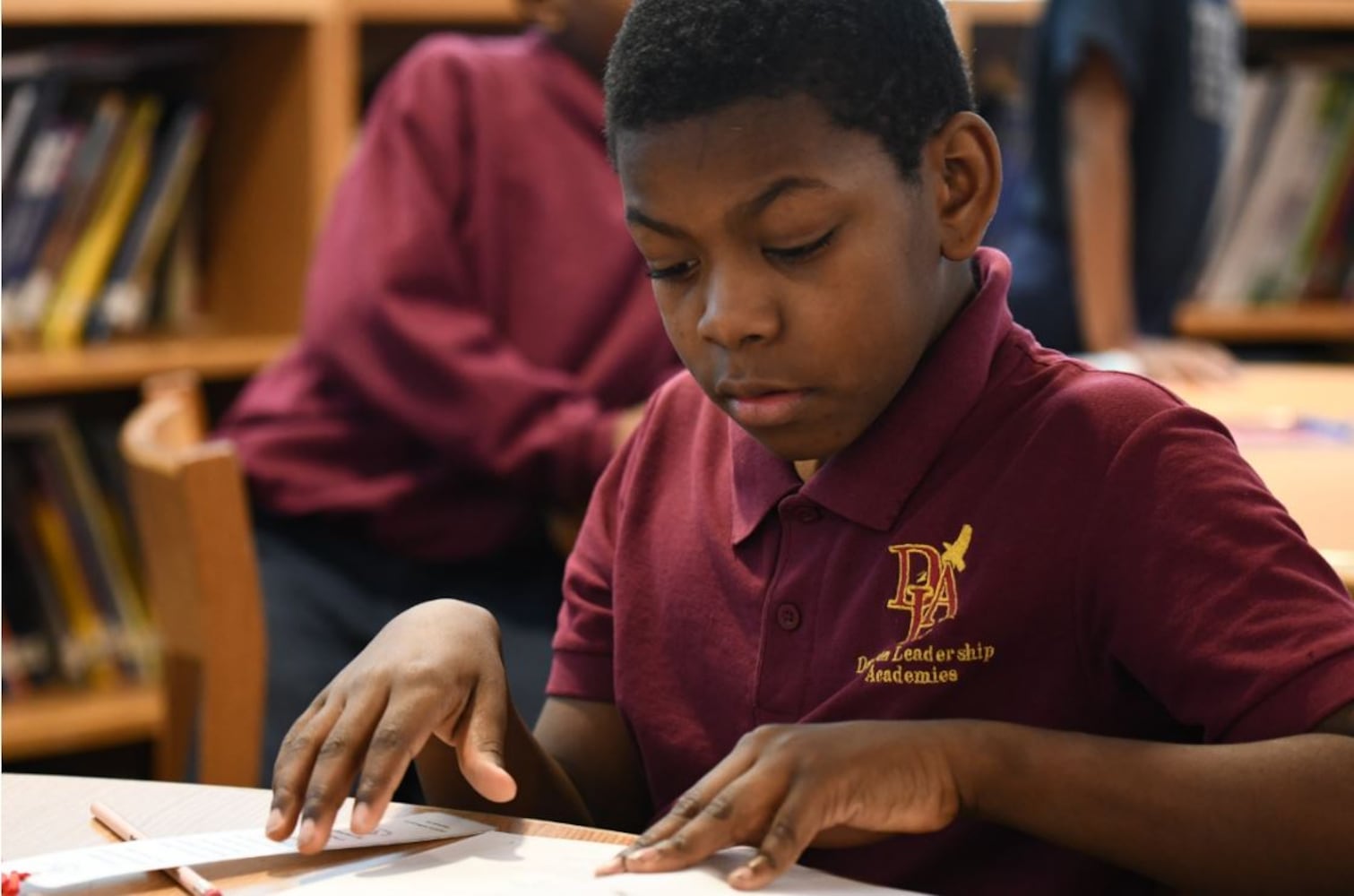 Photos: Dayton Strong! Kids receive copies of book they wrote about tornadoes