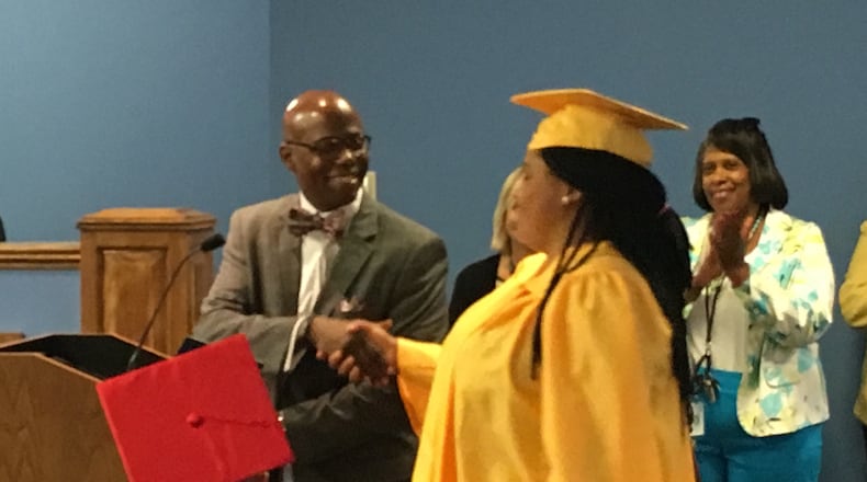 Dayton Public Schools’ grade for five-year graduation rate rose slightly after the Ohio Department of Education fixed a data error. JEREMY P. KELLEY / STAFF