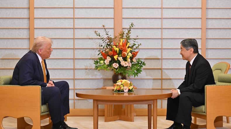 President Donald Trump, left, and Japan's Emperor Naruhito talk during their meeting at the Imperial Palace in Tokyo, Oct. 27, 2025. (Kazuhiro Nogi/Pool Photo via AP)