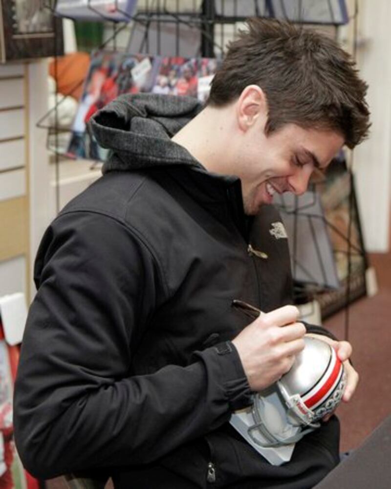 OSU's Dane Sanzenbacher signs autographs