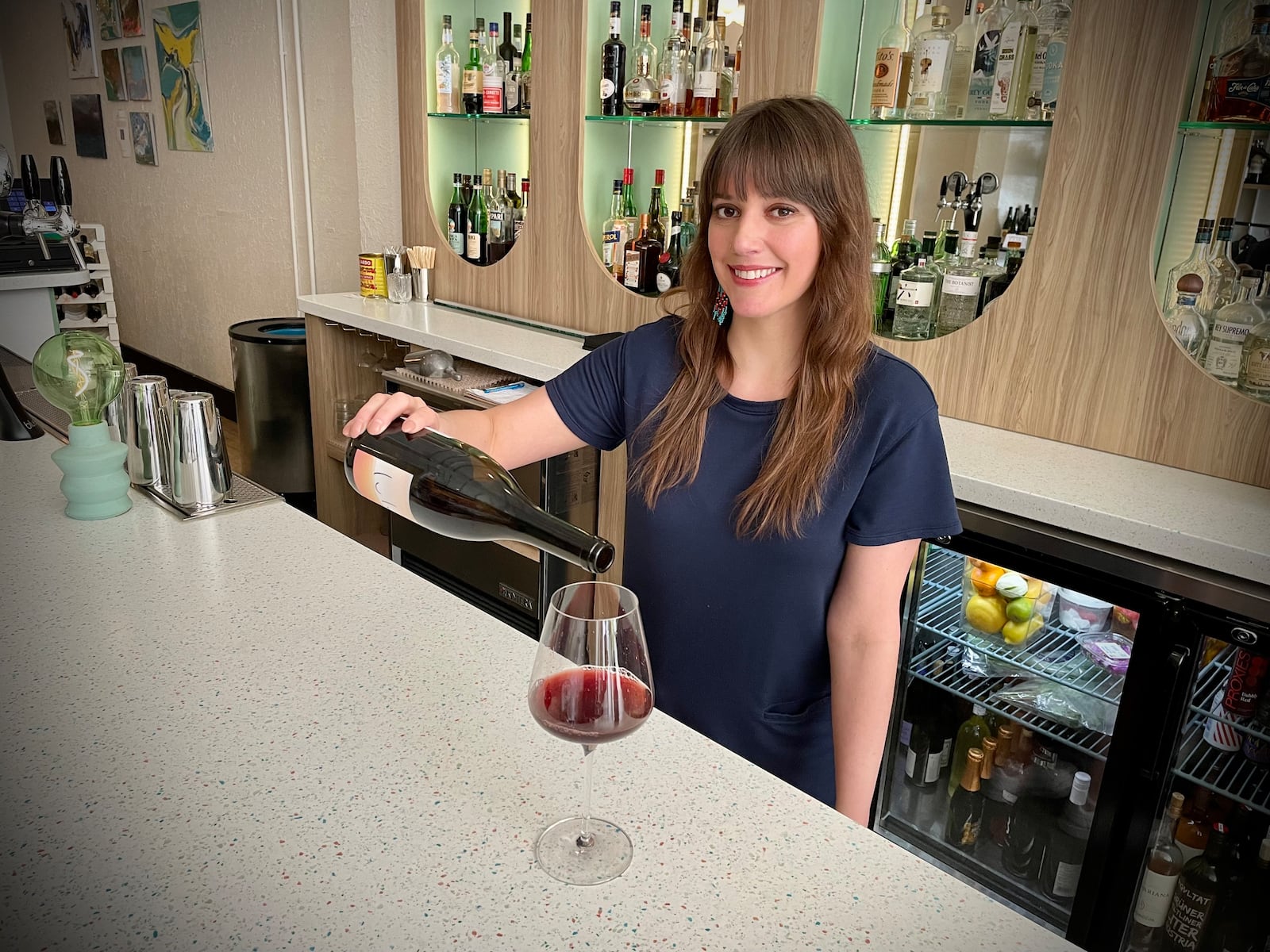 Lauren Gay is the owner of Joui Wine, located at 117 E. Third St. in Dayton's Fire Blocks District. NATALIE JONES/STAFF