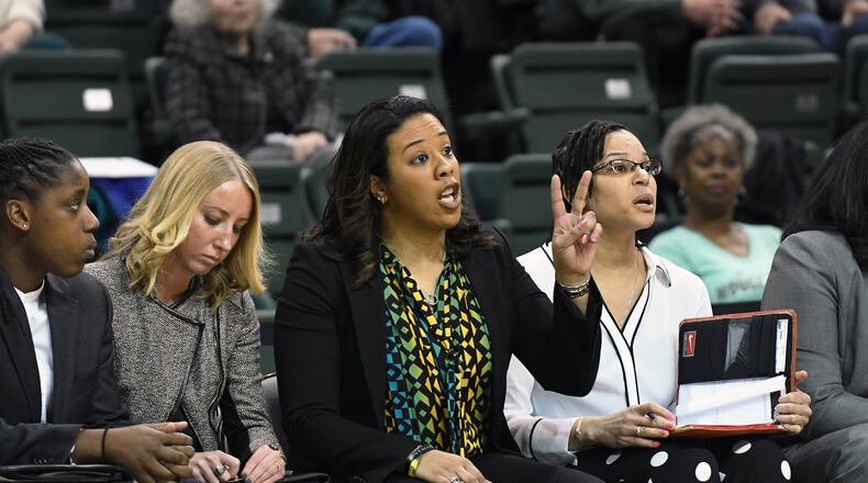 Wright State women’s basketball coach Katrina Merriweather (center). Wright State Athletics photo