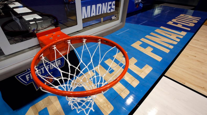 The floor, backbooards and hoops are ready for the NCAA First Four games a UD Arena. Team practices start on Monday for the first game on Tuesday at 6:30. TY GREENLEES / STAFF