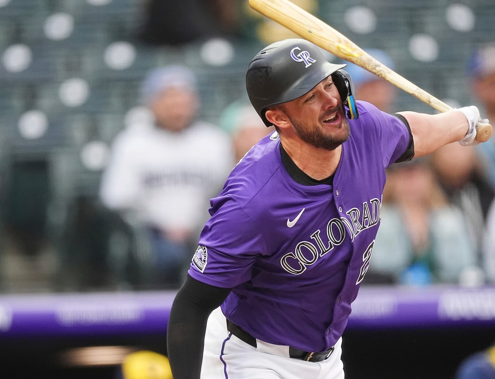 Colorado Rockies' Kris Bryant grounds out against Milwaukee Brewers starting pitcher Freddy Peralta to end the first inning of a baseball game Tuesday, April 8, 2025, in Denver. (AP Photo/David Zalubowski)
