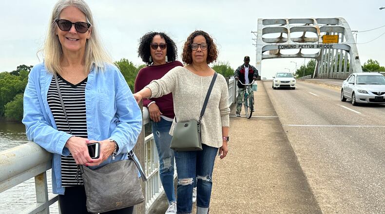 Bridget, Donna and Vicki stand by Edmund Pettus Bridge, where the famous 34-mile walk began to make voting rights accessible to Blacks. Contributed photos