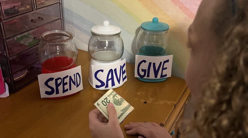 Taking time and letting your child make lists of needs and wants is a great first step to familiarize them with responsible spending. PAMELA CHANDLER/CONTRIBUTED