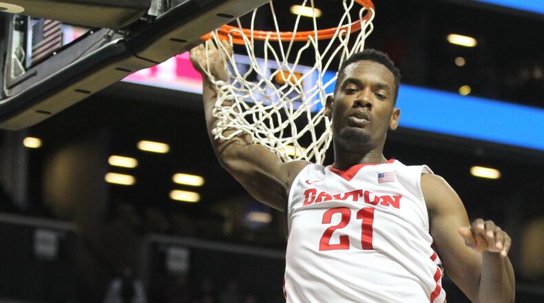 Dayton's Dyshawn Pierre dunks against St. Joseph's in the semifinals of the Atlantic 10 tournament on Saturday, March 12, 2016, at the Barclays Center in Brooklyn, N.Y. David Jablonski/Staff