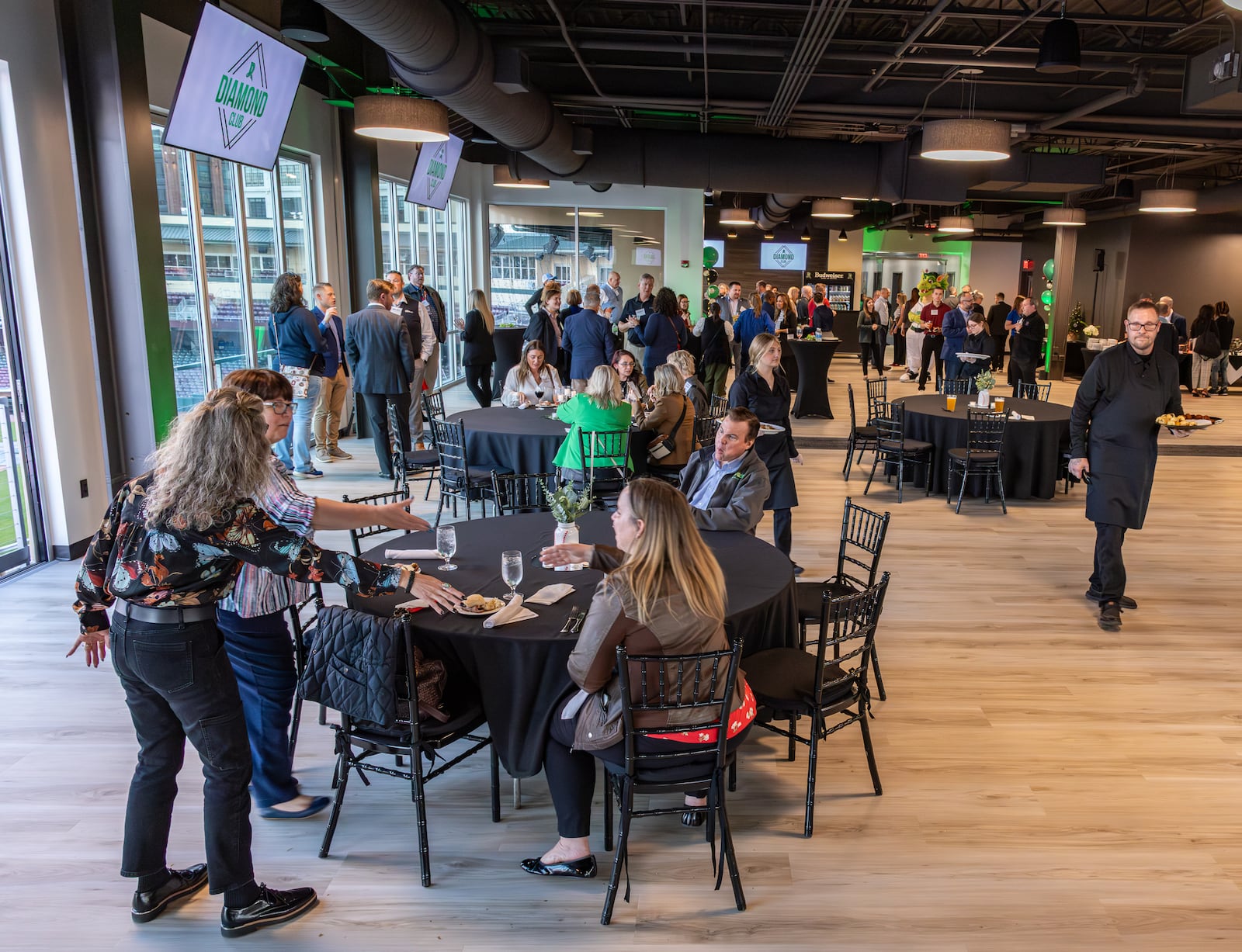 The Dayton Dragons held a ribbon cutting ceremony and open house on Wednesday, Nov. 5 for the Diamond Club at Day Air Ballpark. The 5,000-square-foot venue can seat 75 to 200 guests. The organization is using the venue as a year-round event center for weddings, celebrations and business gatherings. BRYANT BILLING/STAFF