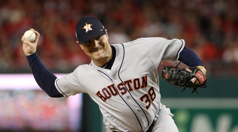 WASHINGTON, DC - OCTOBER 25: Wright State product Joe Smith  of the Houston Astros delivers the pitch against the Washington Nationals during the eighth inning in Game Three of the 2019 World Series at Nationals Park on October 25, 2019 in Washington, DC. (Photo by Patrick Smith/Getty Images)