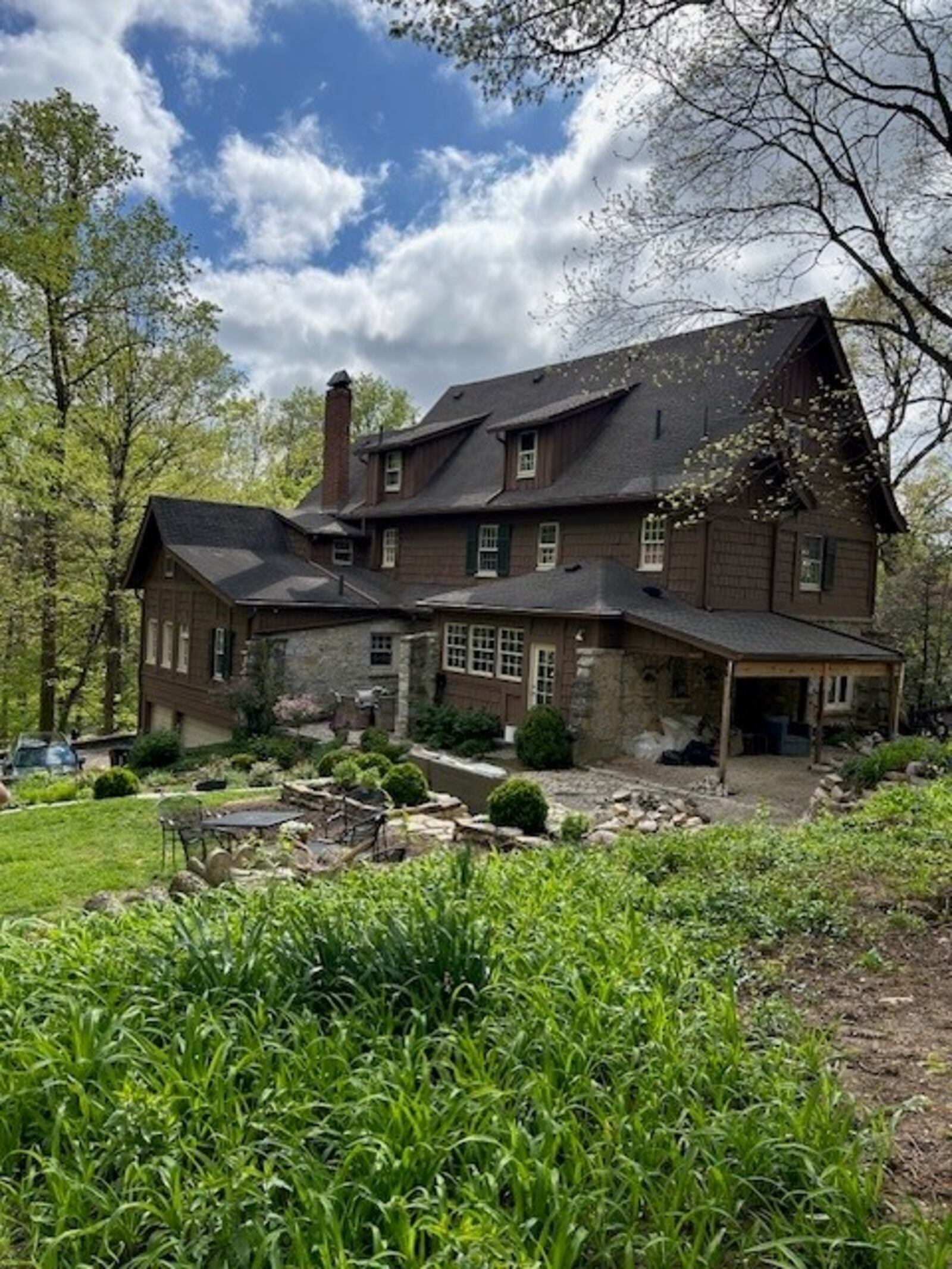 A photo of the backyard at Shadowbrook, Sarena Kelley’s 100-year-old Oakwood home, shows projects complete and in progress. JANA COLLIER/CONTRIBUTED