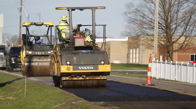 The repaving of Second Street in Xenia has begun. The $1.05 million project to replace the bumpy, pock-marked asphalt is expected to take about two months according to city officials. This view looks west from Ottawa Drive to U.S. 35. While this project does not involve gas tax revenues, the city may use the new gas tax funding for projects like it. TY GREENLEES / STAFF