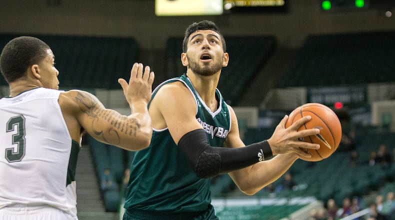 CLEVELAND, OH - DECEMBER 29: Green Bay Phoenix F Kerem Kanter (1) drives to the basket as Cleveland State Vikings G Rob Edwards (3) defends during overtime of the NCAA Men’s Basketball game between the Green Bay Phoenix and Cleveland State Vikings on December 29, 2016 at the Wolstein Center in Cleveland, OH. Green Bay defeated Cleveland State 76-75 in overtime. (Photo by Frank Jansky/Icon Sportswire via Getty Images)