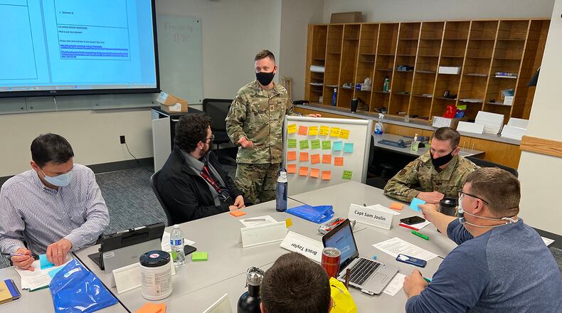 Capt. Trevor Webber, an instructor in the Air Force Institute of Technology’s Civil Engineer School, facilitates a workshop discussion with other faculty to identify opportunities to increase diversity and inclusion topics in CE School policies and course materials, create an action plan for ownership and accountability, and increase outreach within the career field. U.S. AIR FORCE PHOTO/CAPT. DEVIN DEPALMER
